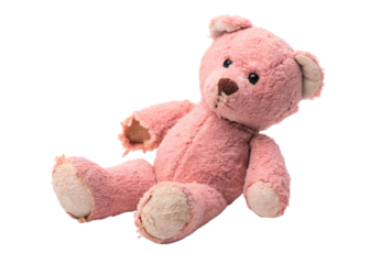 Weathered pink teddy bear seated worn appearance, isolated on a transparent background