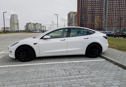 Tesla Model 3 parking on street