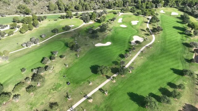 Aerial view, Spain, Balearic Islands, Mallorca, Capdepera, Cuevas de Arta and Platja de Canyamel with golf course, sand bunker, green, golfer