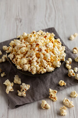 Homemade Salty Popcorn in a Bowl, side view.