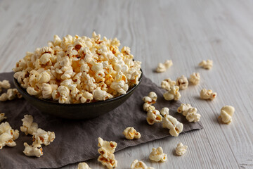 Homemade Salty Popcorn in a Bowl, low angle view.