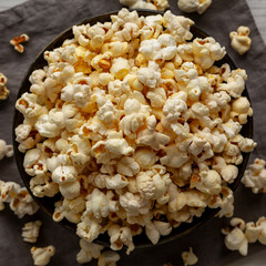 Homemade Salty Popcorn in a Bowl, top view. Flat lay, overhead, from above.