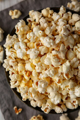 Homemade Salty Popcorn in a Bowl, top view. Flat lay, overhead, from above.
