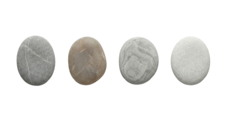 Four smooth, diverse colored pebbles arranged in a row on a plain black surface