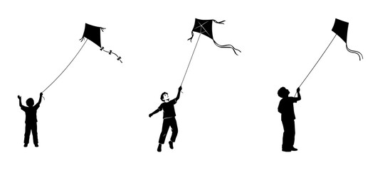 Silhouettes Flying Kites on a Sunny Day