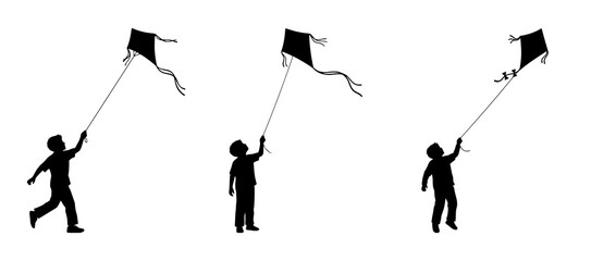Silhouettes of Children Flying Kites