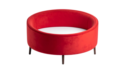 A low, round seat with red velvet exterior and white interior, resting on dark legs
