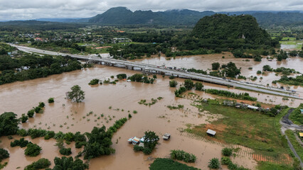 Aerial view of Mae Kok river rising during typhoon Yagi has swept Southeast Asia. This river is the...
