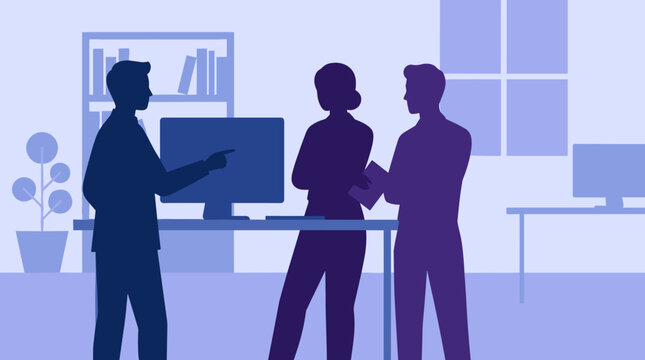 Three business people silhouettes in a modern office discussing a project, with one colleague pointing at the computer monitor during a team meeting
