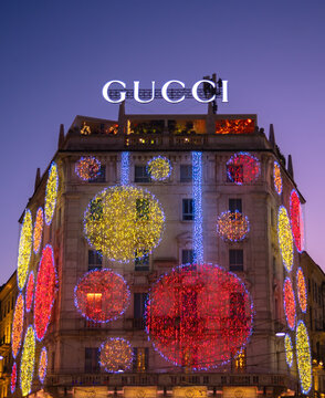Milan, Italy - December 9, 2025: Christmas decorated building and store of Gucci in Milan, one of the most renowned luxury fashion brands in the world
