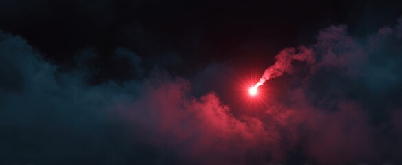 The vivid bright red signal flare illuminates the vast dark night sky vividly.