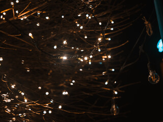 Warm Fairy Lights at Night Creating Abstract Bokeh Background with Festive Holiday Atmosphere and Soft Golden Glow