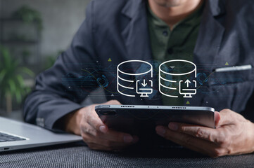 Data Transfer Network Concept with Person Using Tablet in Office Setting