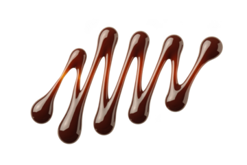 Luscious dark chocolate or caramel sauce drizzled in a wavy pattern over a black background isolated on transparent background