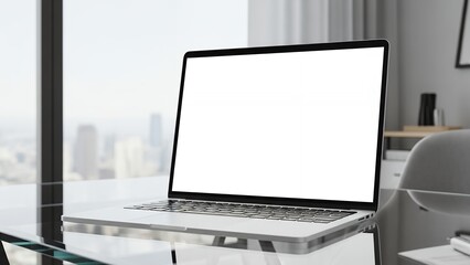 Fototapeta premium Modern Laptop with Blank Screen on Glass Desk in Contemporary Office