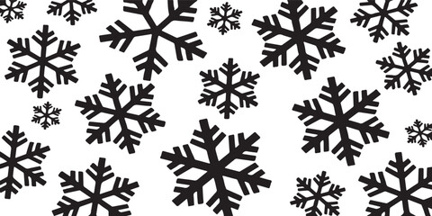 Fototapeta premium Abstract Black and White Graphic Pattern of Assorted Sized Snowflakes Scattered for Winter or Holiday Background.