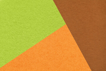 Fototapeta premium Geometric green, orange and brown texture paper background for presentation, banner or card design template