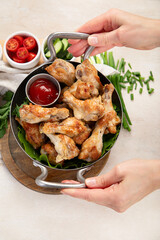 Grilled chicken wings with salt, spices and herbs.