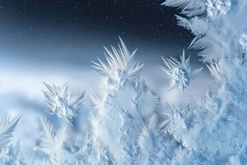 Delicate frost crystal clusters with sharp icy spikes against deep winter sky
