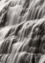 Fototapeta premium abstract close-up view of cascades and rivulets of the Dynjandi waterfall in the Westfjords of Iceland