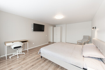 Luxurious master home bedroom interior, modern house, beautiful interiors, wide bedroom. 