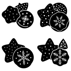 Four Black Cookies with Snowflake Decorations on White Background holiday