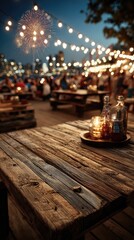 Rustic table at a lively outdoor party under string lights, fireworks