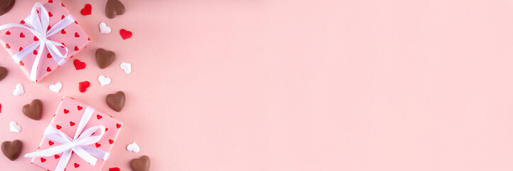 Romantic Valentine day background with hearts, gift boxes, heart-shaped chocolates. St Valentine’s day dating menu for restaurant, cafes, party invitation background copy space