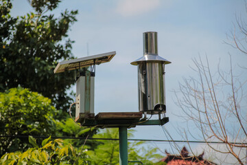Air quality monitoring station powered by solar outdoors.