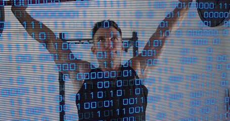 Lifting man holding barbell overhead in gym rack, black tank and gloves, blue binary scanline