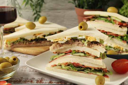 Different Italian tramezzini sandwich in tradition triangle form	