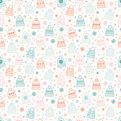 Colourful seamless pattern with cute hand drawn winter hats. Christmas background concept. Vector illustration