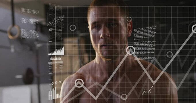 Fit man gripping handle and pushing forward in gym, HUD line, bar charts tracking fitness progress