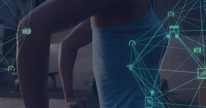 Mid-adult woman gripping platform and doing triceps dips for fitness, teal overlaying right half