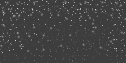 Falling snow overlay on dark background, winter weather effect, abstract motion blur