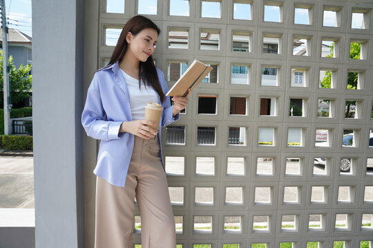 Happy women relaxing together at home outdoor with coffee