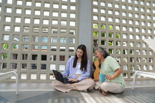 Happy family relaxing together at home outdoor with coffee
