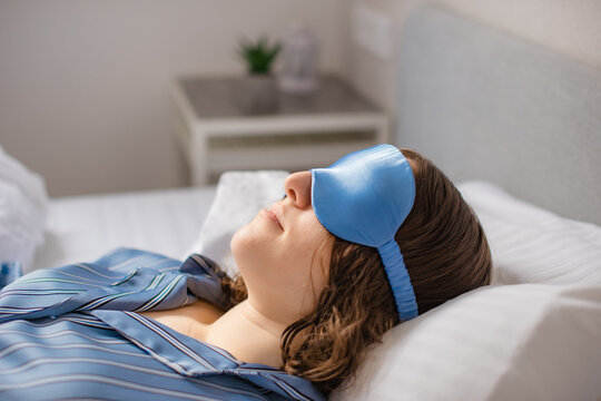 Cozy Bedroom Scene with Woman Sleeping - Powered by Adobe