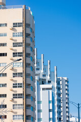 Large and striking buildings, both new and old, on Santander Avenue in Cartagena, Colombia.