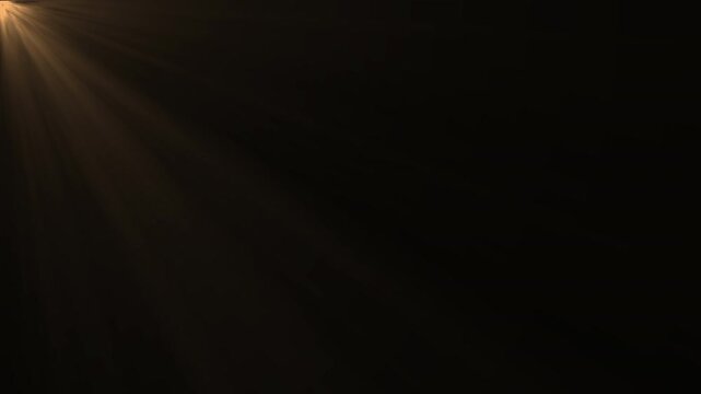 Loop corner glow gold light optical lens flares shine animated on black background. Warm shine light rays looping 4k video. Luminous star motion