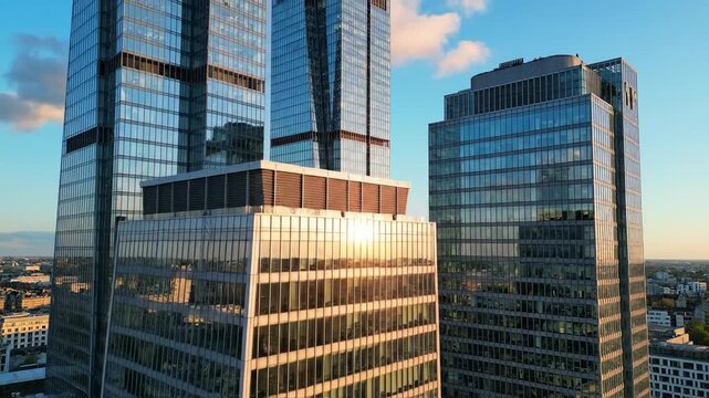 Modern glass skyscrapers reflecting sunlight architecture and urban environment