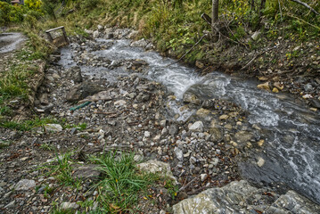 Mountain landscapes, water, and village