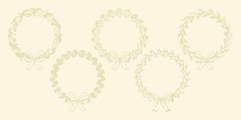 Elegant floral wreaths with ribbons decorative frames in a delicate pastel palette