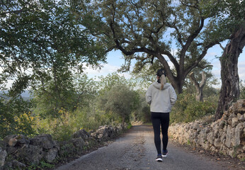 Fototapeta premium Happy girl smiling and enjoying while hiking