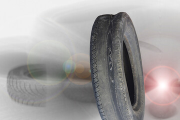 Naklejka premium old worn damaged tire as pattern of damaged tire for advertising tire shop or car tire shop