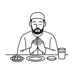 Muslim man offering prayer before breaking fast with traditional meal