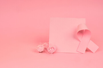 A breast cancer awareness concept featuring a symbolic ribbon beside a blank space representing hope, prevention and personal messages.
