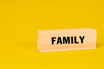 A family concept represented with a highlighted word block symbolizing connection, unity and shared belonging.
