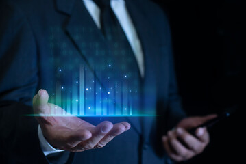 Businessman holding big data futuristic glow lines. Big data analytics and business intelligence analytics. Datum digital background.