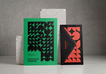 Template Mockup Letterhead and Envelope Branding Set on Stone Background